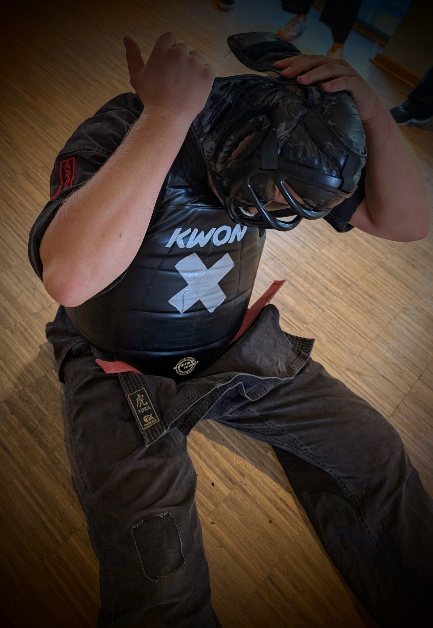 Praktische Trainingssituation mit Schutzkleidung